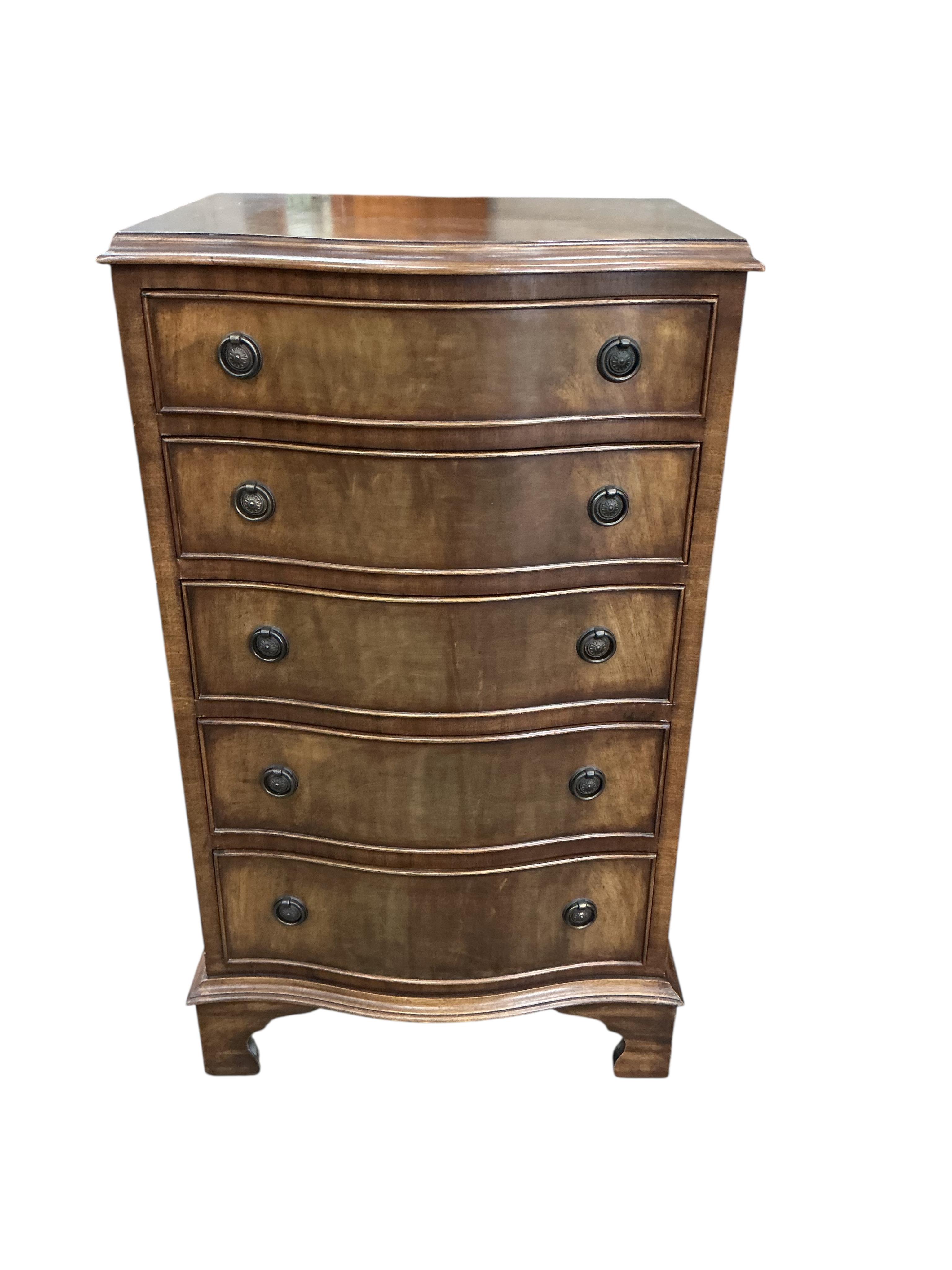 A reproduction George III style mahogany serpentine chest of five drawers, width 54cm, depth 41cm, height 92cm